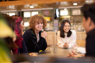 Students talking in a café
