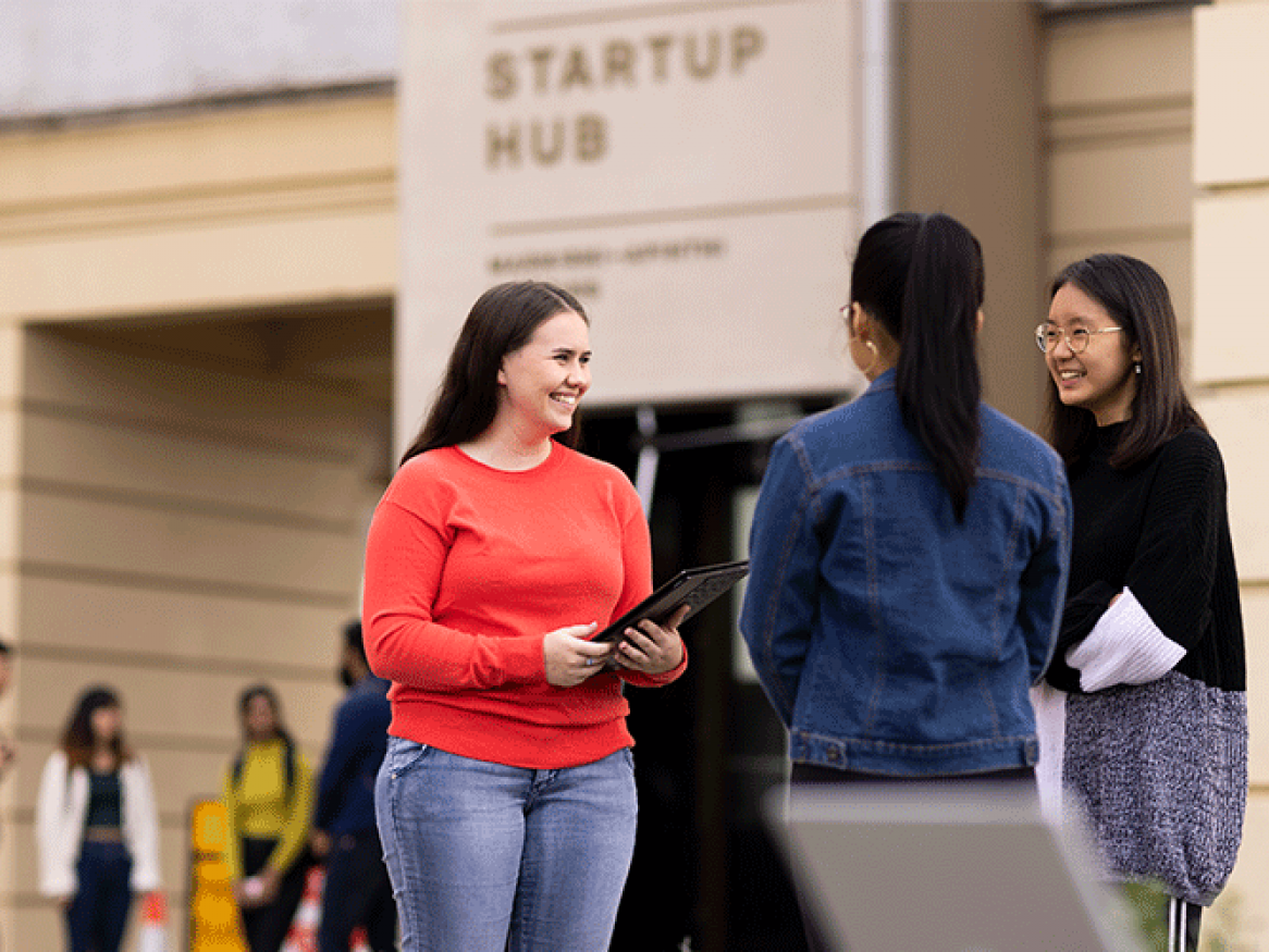 Students standing out the front of the startup hub at lot fourteen