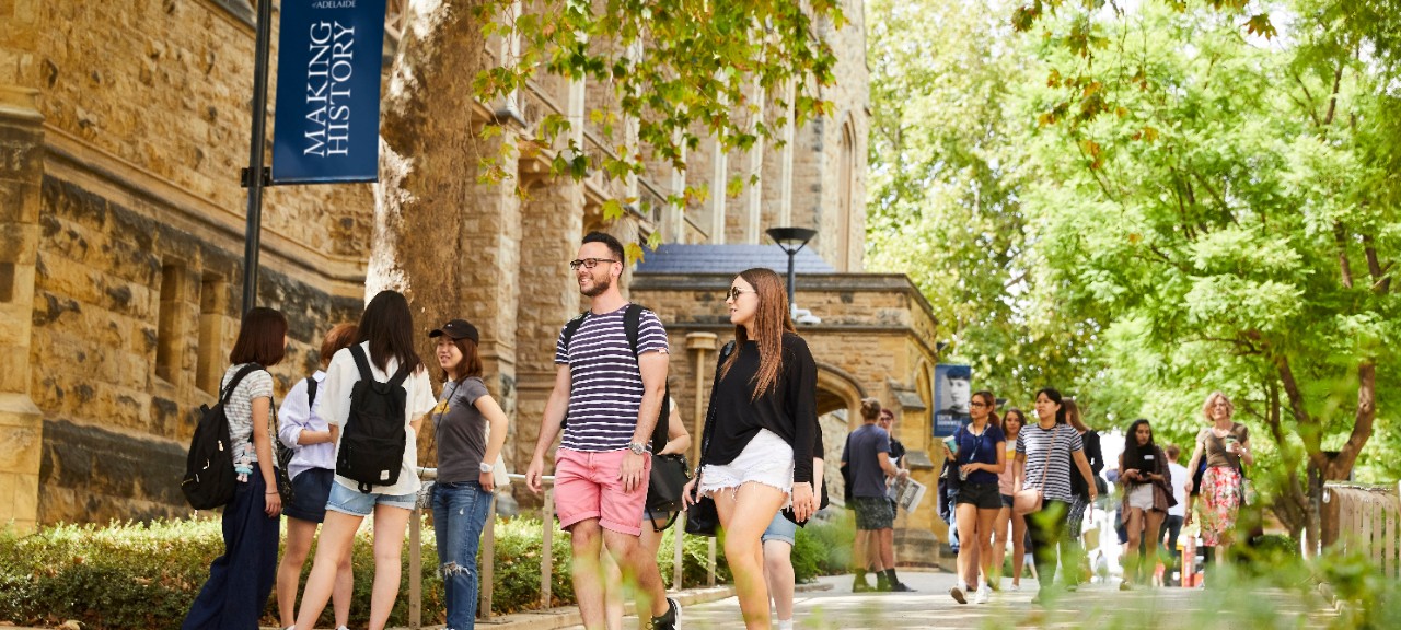Students socialising and walking together on campus